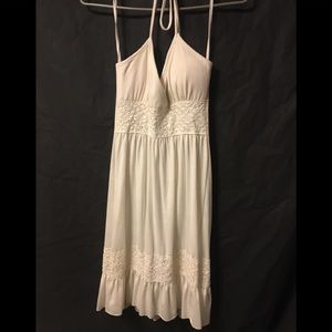 Sleeveless cream colored dress